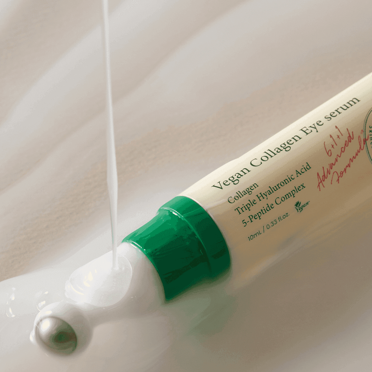 Aplicador CoolTouch y textura del sérum de ojos AXIS-Y